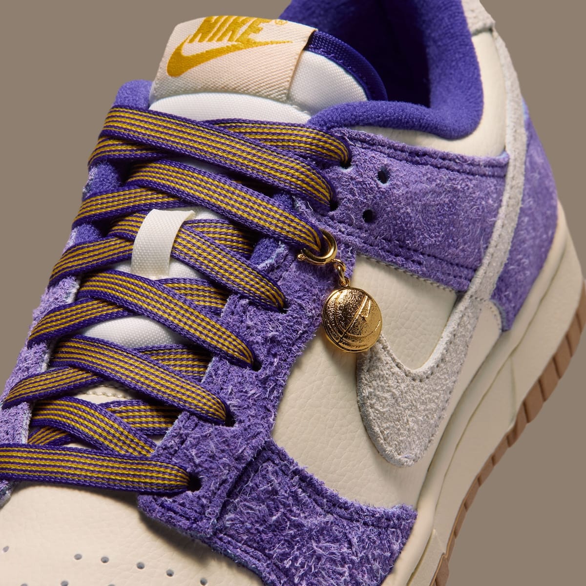 Nike Dunk Low Game Day top-down view with purple and gold varsity laces