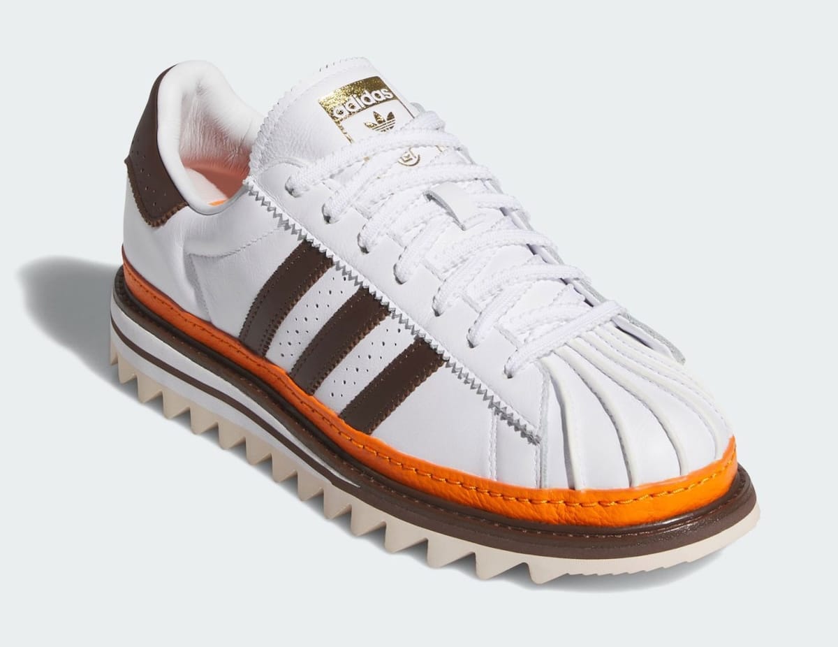 CLOT x adidas Superstar Unity Orange three-quarter lateral and top-down view