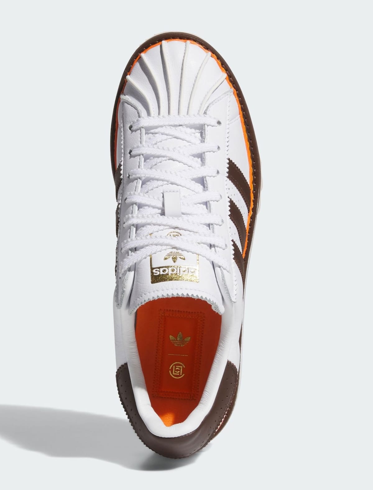 CLOT x adidas Superstar Unity Orange top-down view showing orange co-branded insole