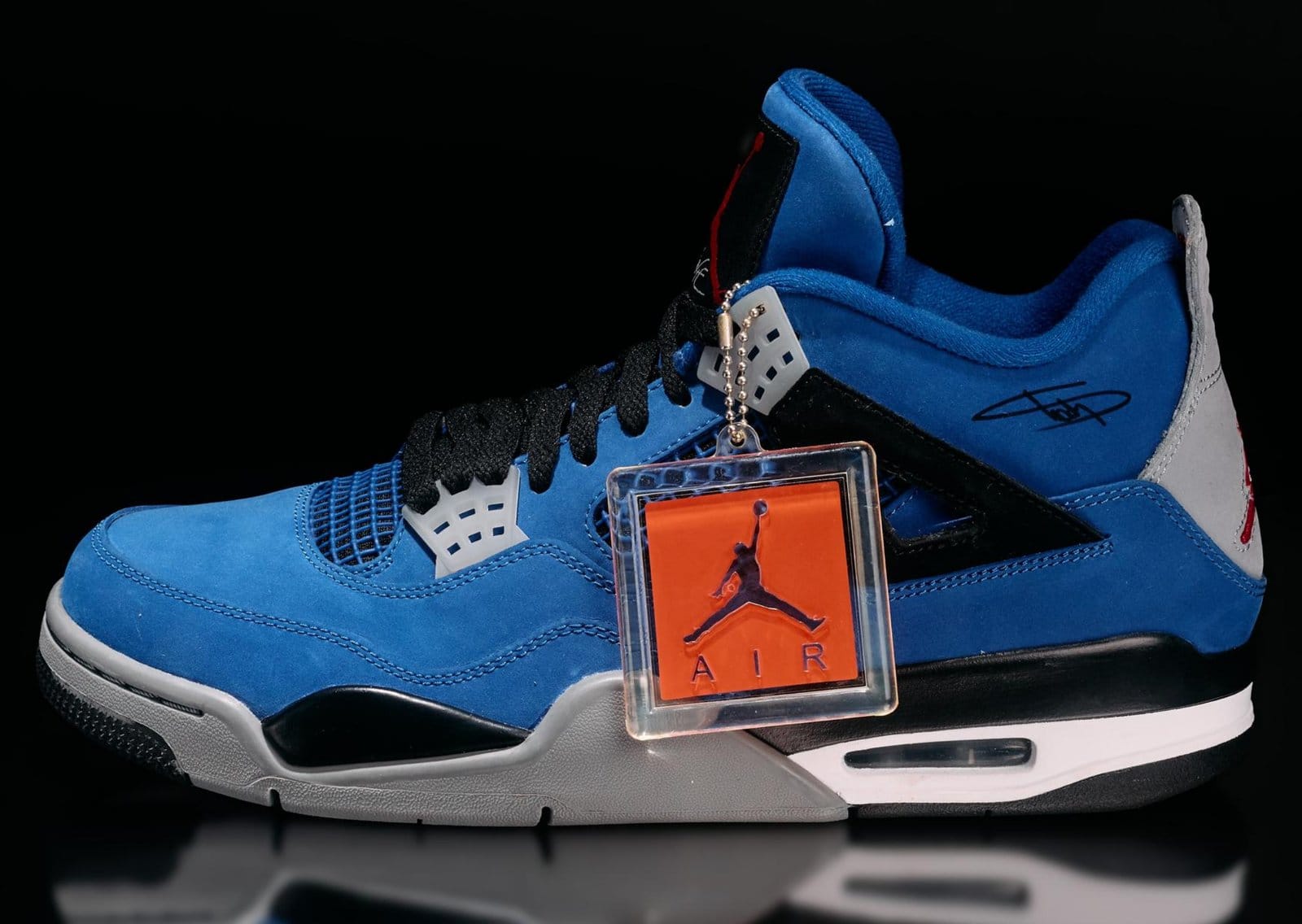 Signed Eminem x Carhartt x Nike Air Jordan 4 sneaker in royal blue with Jordan Air hangtag