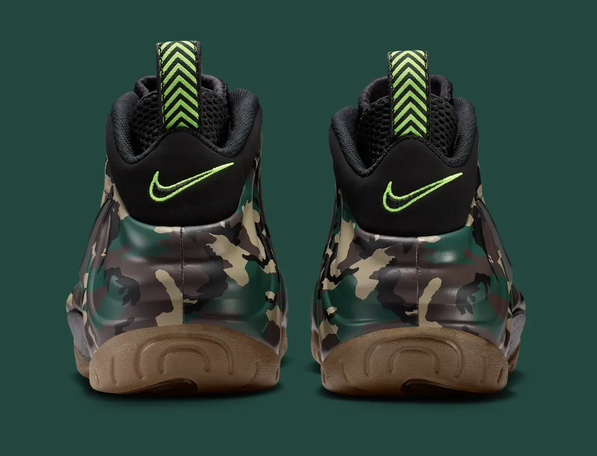 Heel view of the Nike Air Foamposite Pro Green Camo showing the neon chevron pull tabs