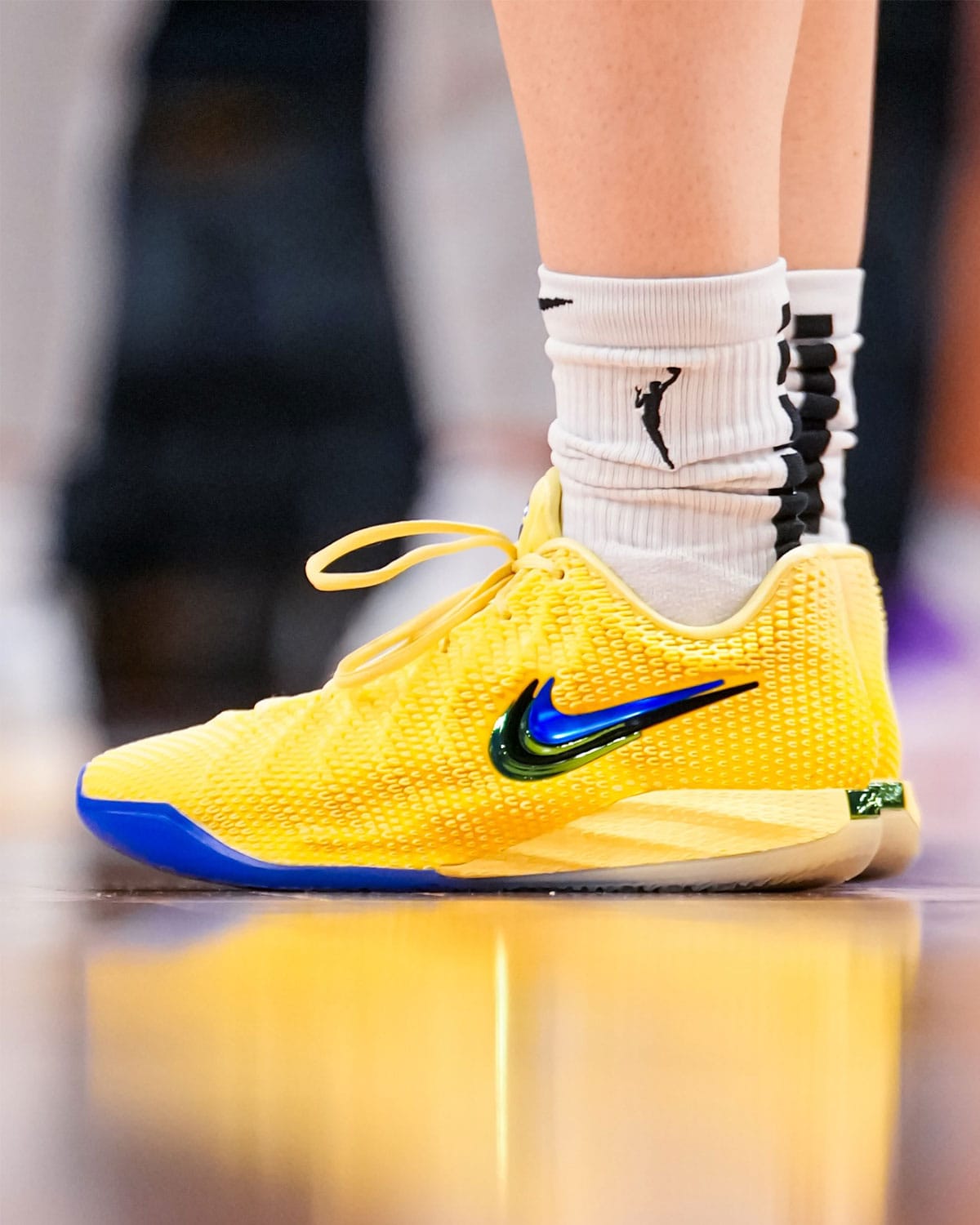 Nike Caitlin 1 Yellow Zest lateral view in Fever yellow and blue