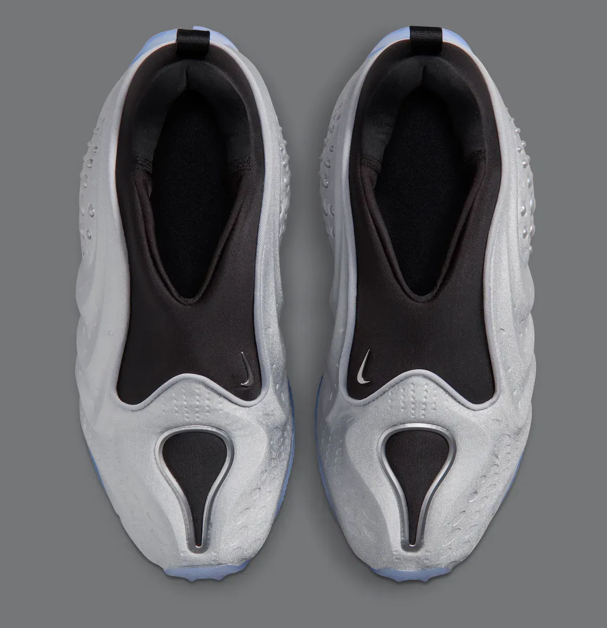 Nike First Sight Shadow Metallic Silver top-down view showing the black neoprene bootie and teardrop toe opening