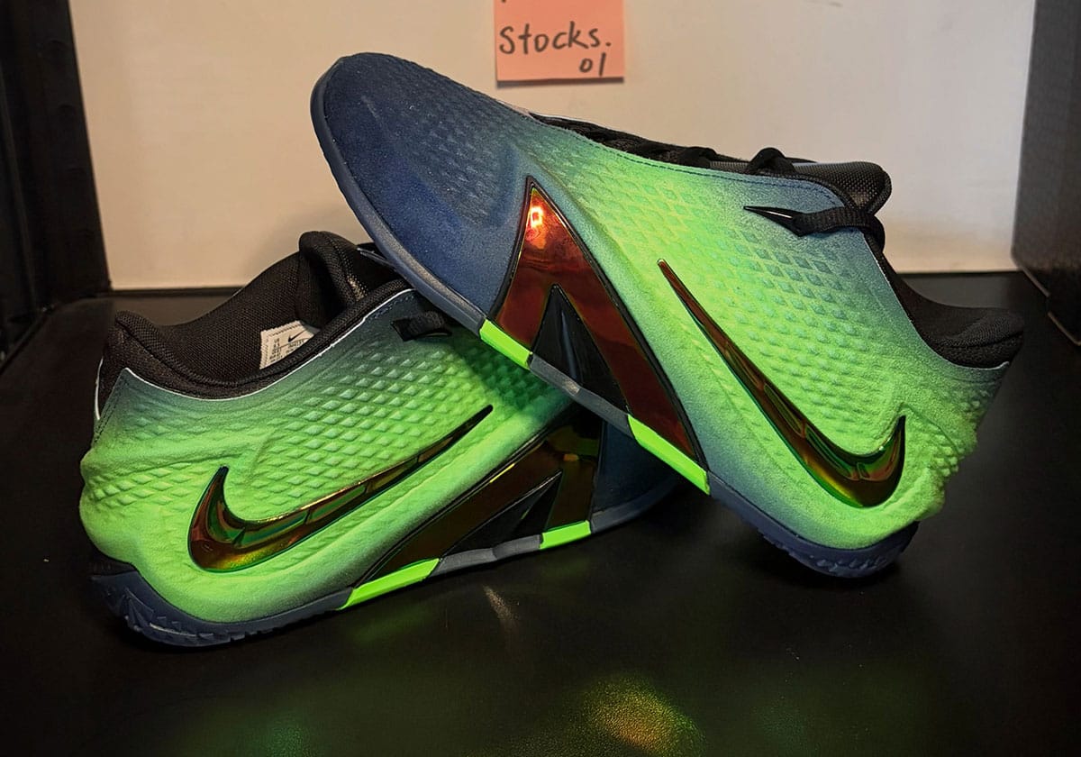 Nike Ja 4 Nightmare lateral profile in obsidian and voltage green