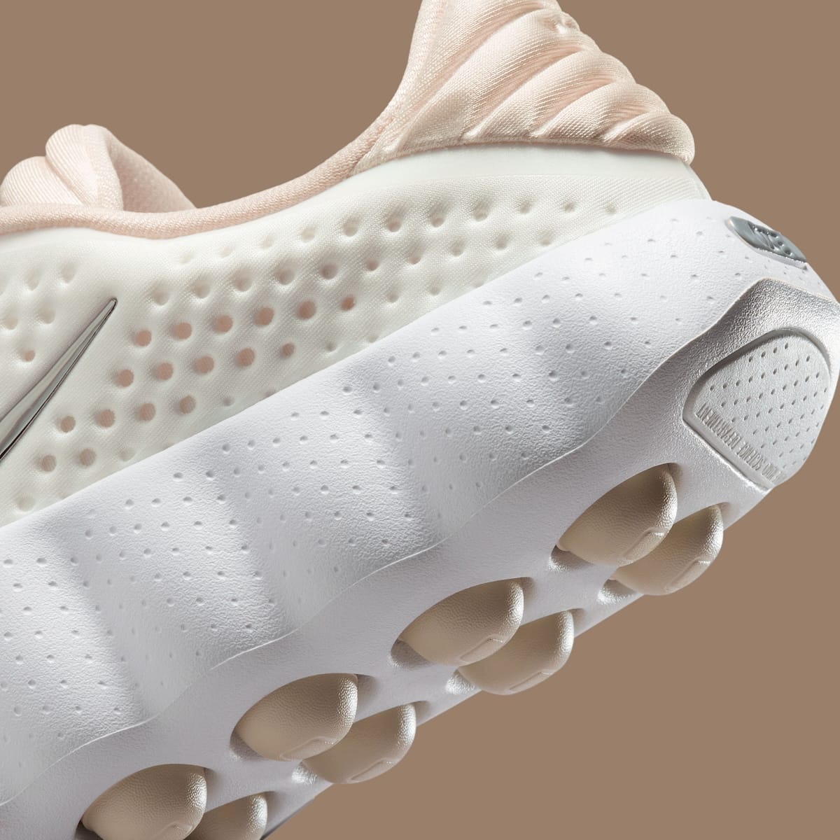 Nike Mind 002 Summit White sole and perforation detail