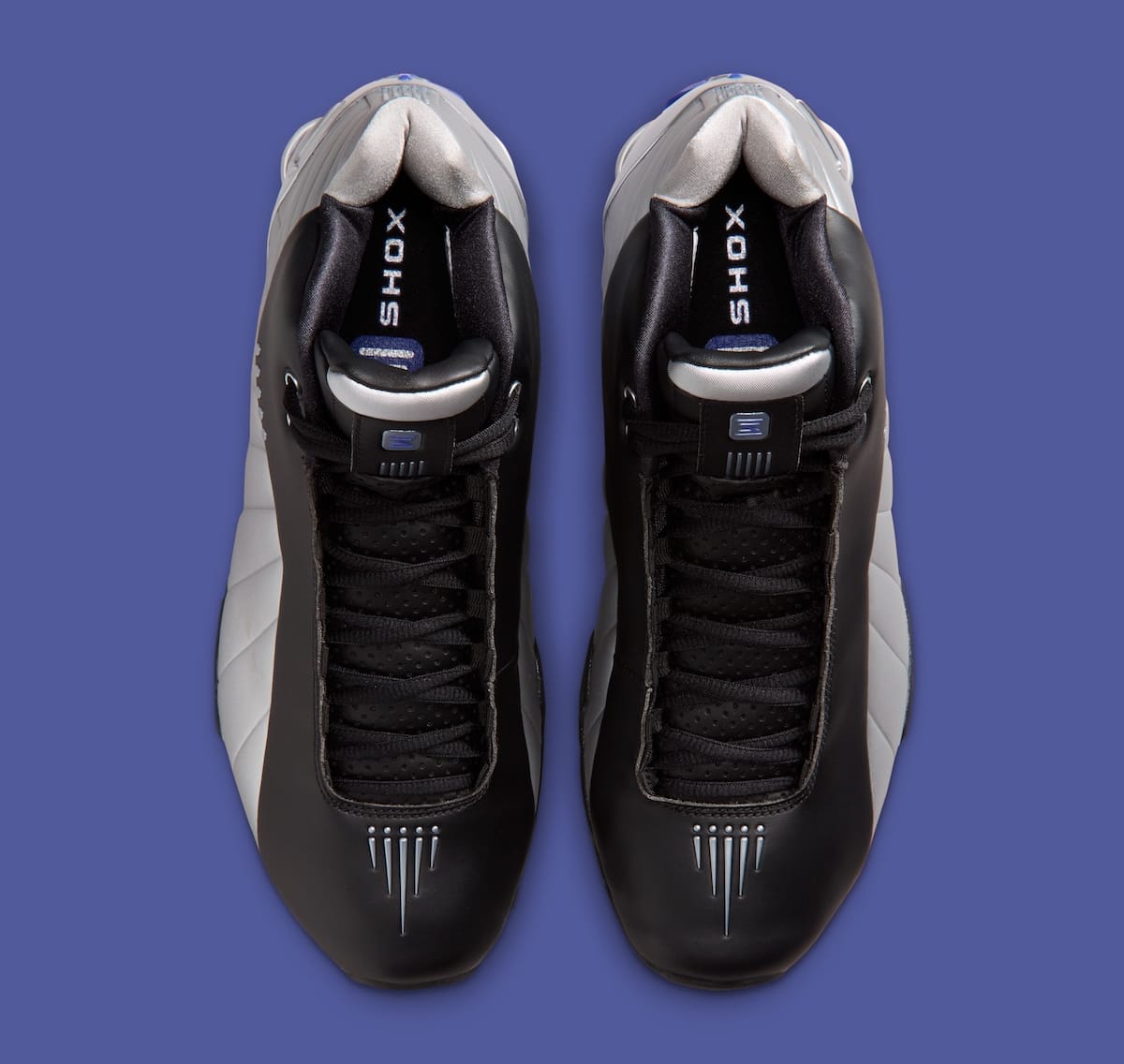 Nike Shox BB4 OG Black/Lapis top-down view showing Shox tongue branding