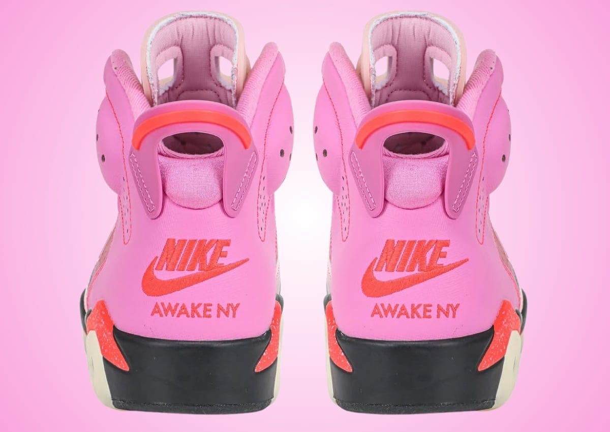 Heel detail of the Awake NY x Air Jordan 6 Playful Pink showing stacked Nike and AWAKE NY branding in Infrared 23