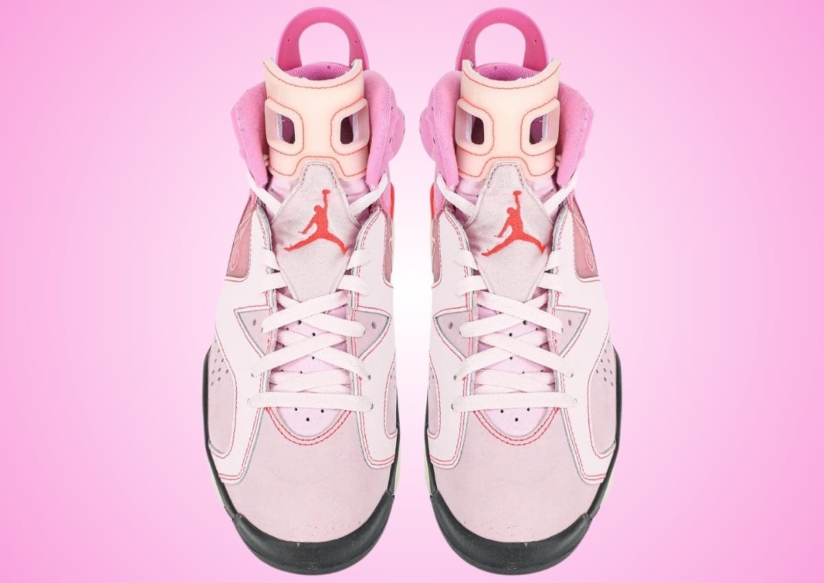 Top-down view of the Awake NY x Air Jordan 6 Playful Pink showing the tongue, lace lock and Jumpman branding