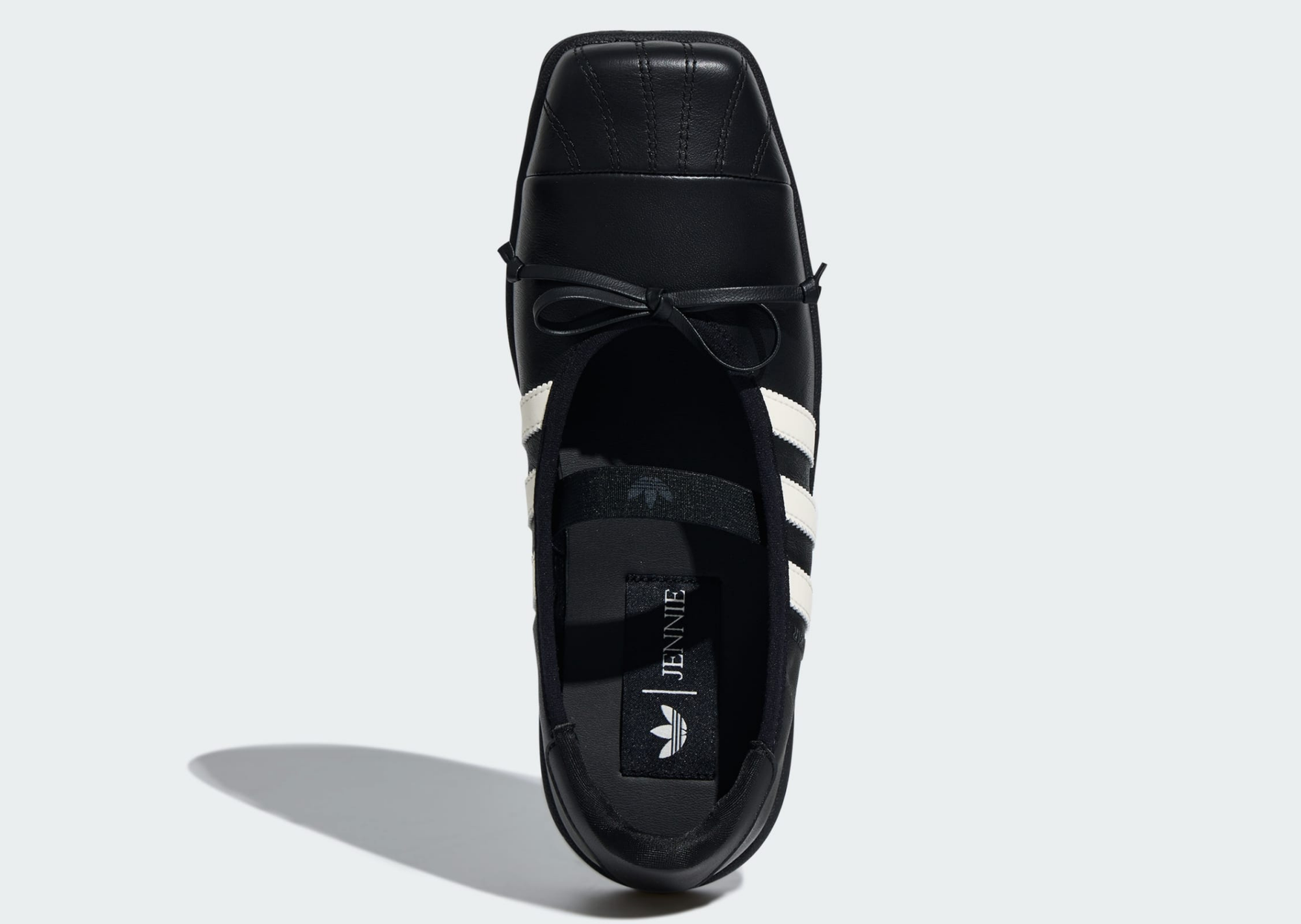Top-down view of the black JENNIE x adidas Superstar Square Ballet showing the squared shell toe, bow and JENNIE insole tag