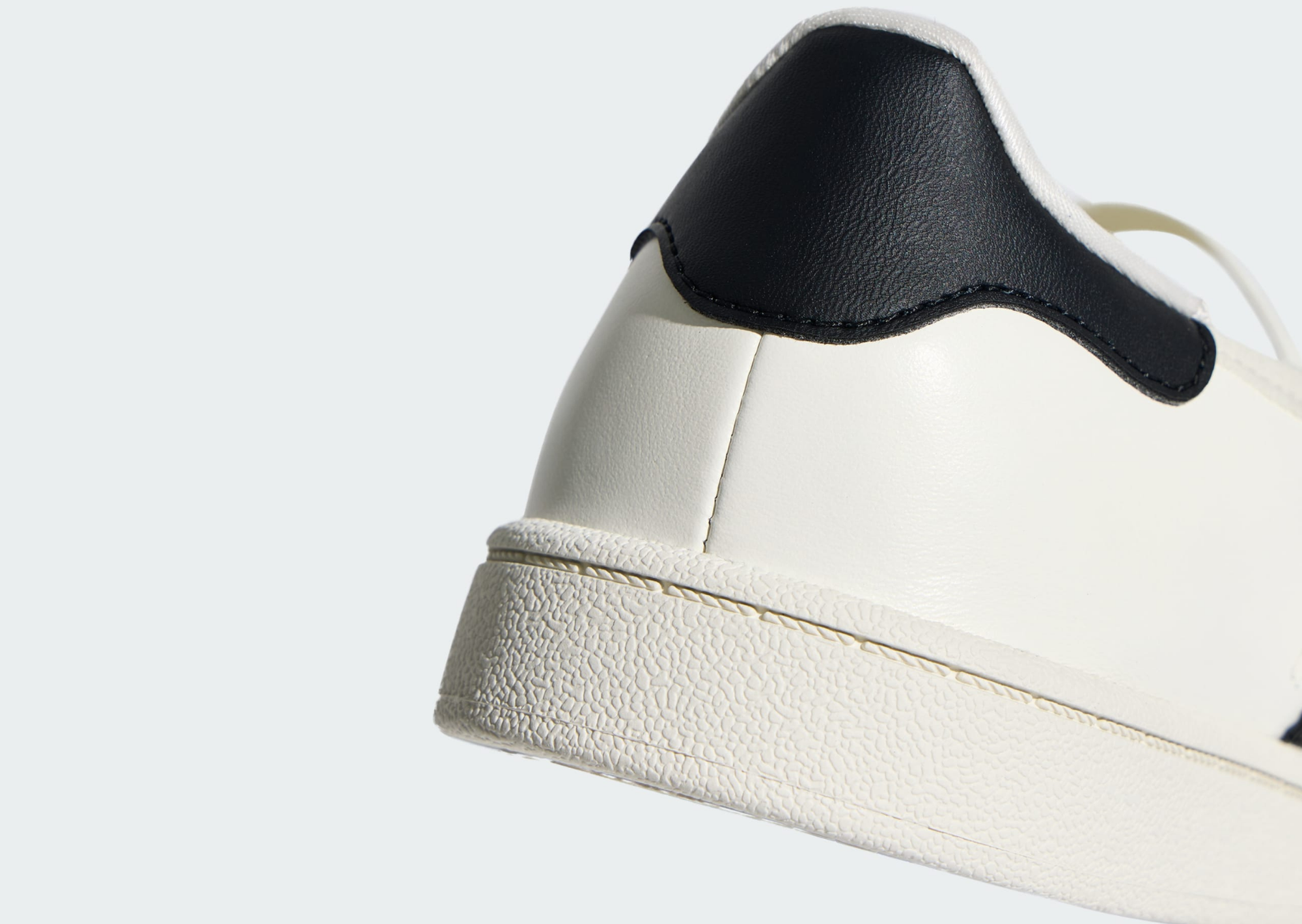 Heel detail of the off-white JENNIE x adidas Superstar Square Ballet showing the elastic strap