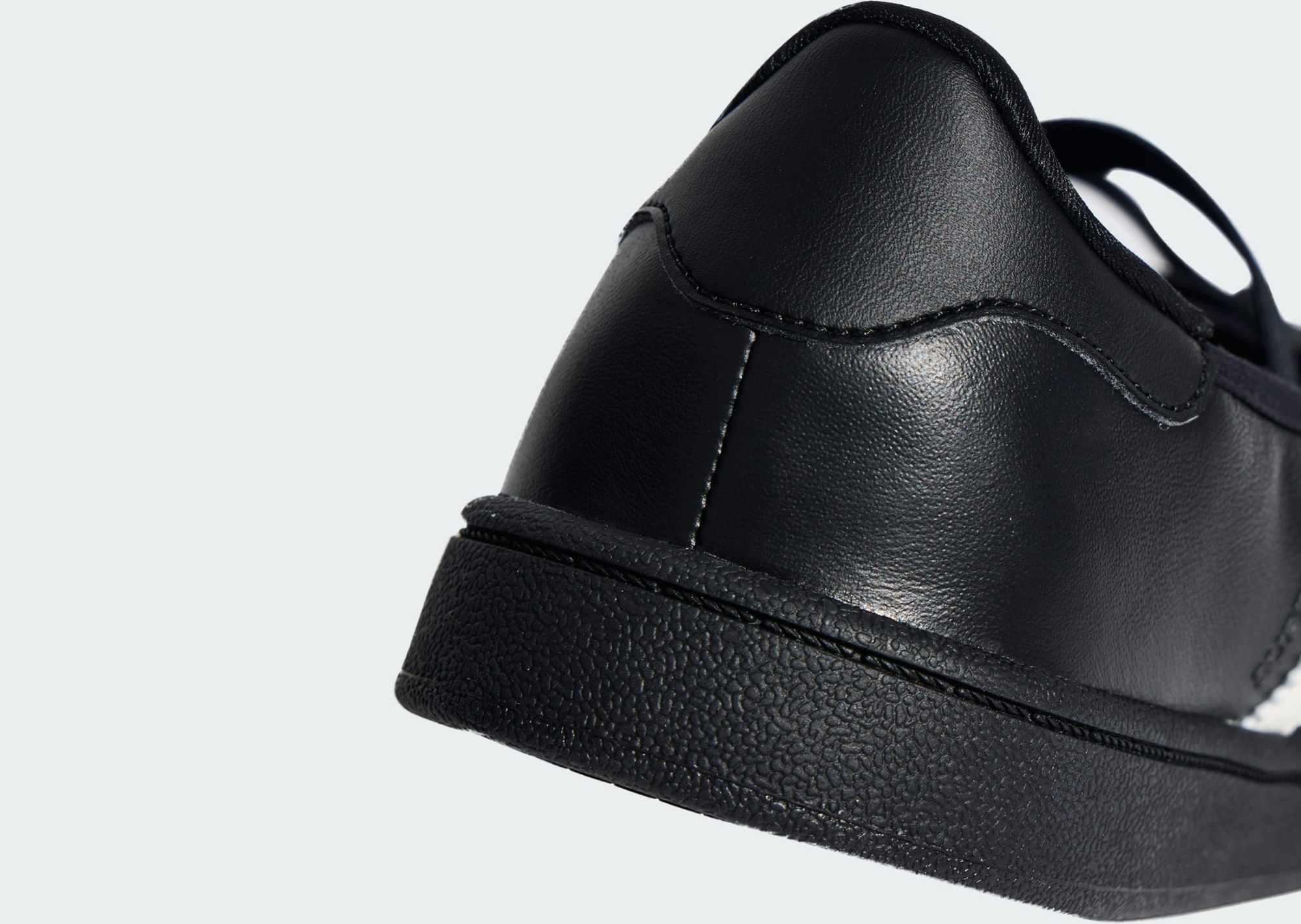 Close-up of the black JENNIE x adidas Superstar Square Ballet upper and midsole
