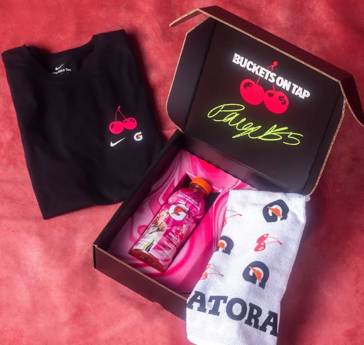 The Buckets on Tap package with a Shirley Temple Gatorade bottle, co-branded Nike tee and Gatorade towel