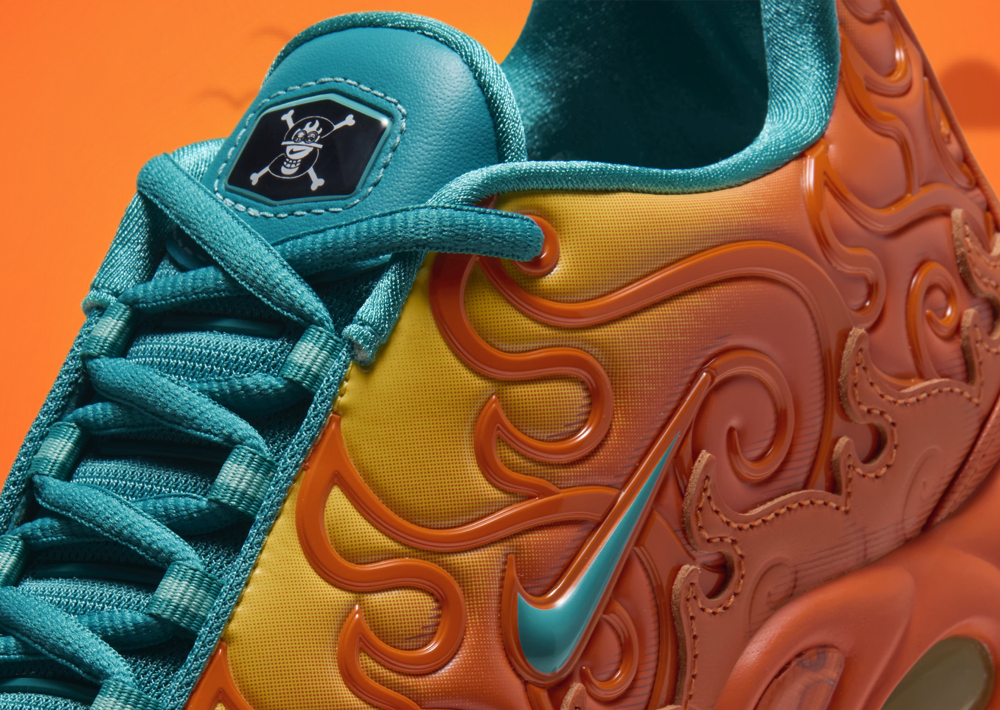 Detail of the Nike-designed Jolly Roger patch on the tongue of the Mera Mera no Mi Air Max Plus