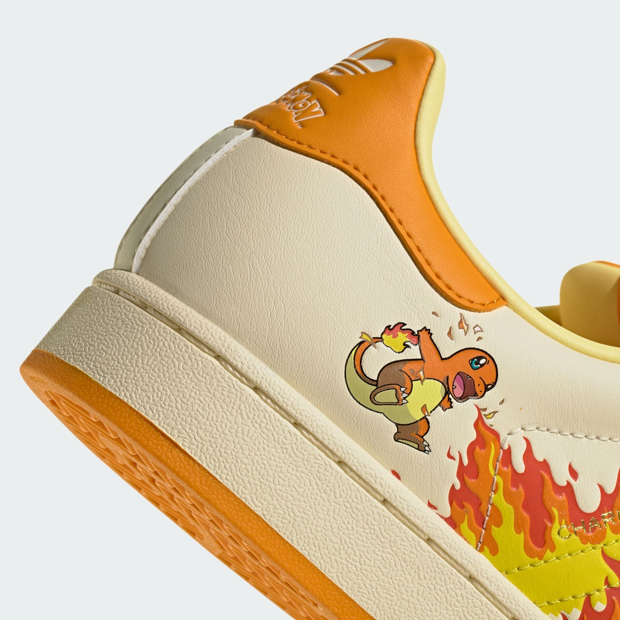 Pokémon x adidas Superstar Charmander in cream white with shock yellow and orange trim