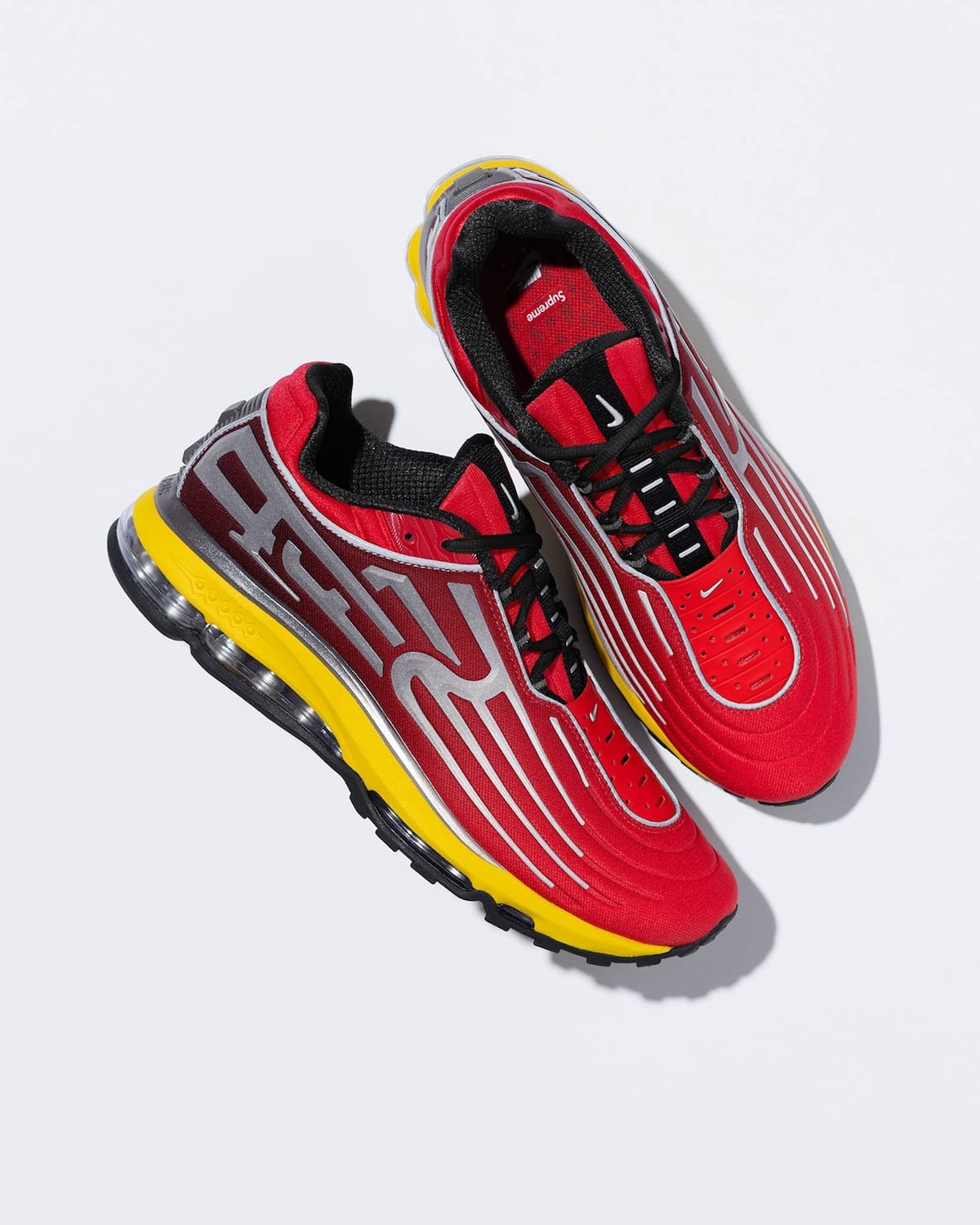 Lateral view of the Supreme x Nike Air Max 2001 Air Ecstasy in University Red/Speed Yellow-Gym Red