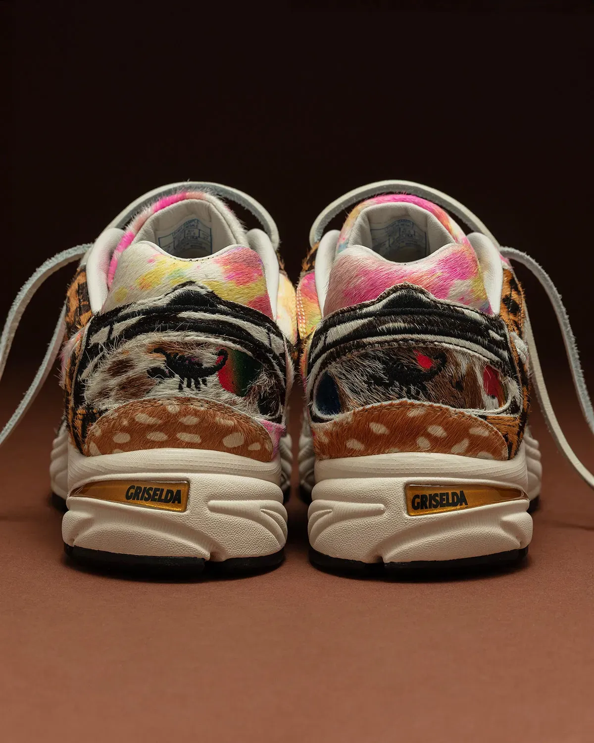Heel detail of the Westside Gunn x Saucony Grid Jazz 9 Awesome Gods with gold accent