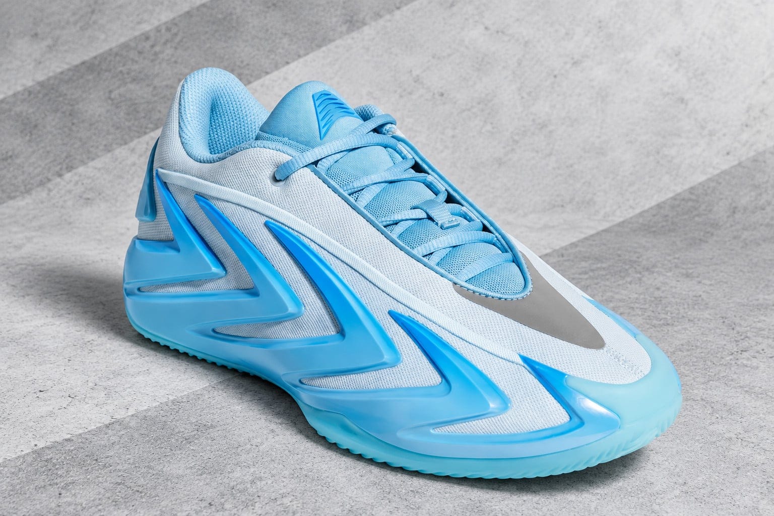 Lateral view of the adidas Anthony Edwards 3 Cold Blooded in Bliss Blue and Sky Tint