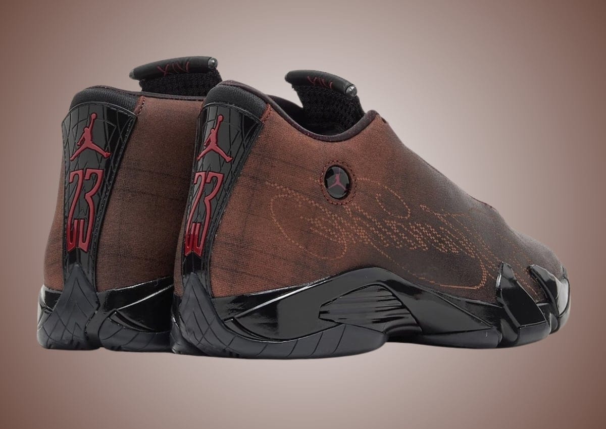 Mowalola x Air Jordan 14 heel view showing black patent panels, red 23 branding and the Jumpman