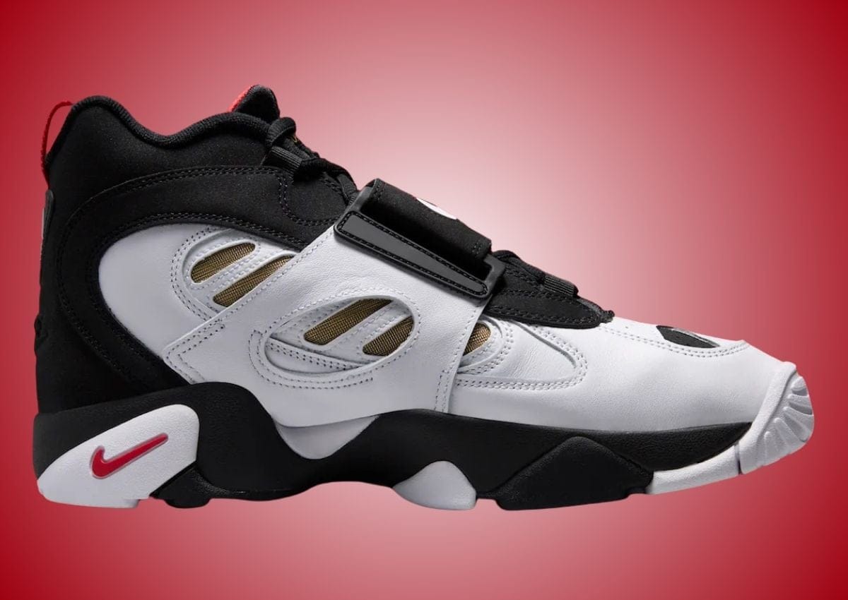 Medial view of the Nike Air Diamond Turf 2 "49ers" showing the gold mesh side panels