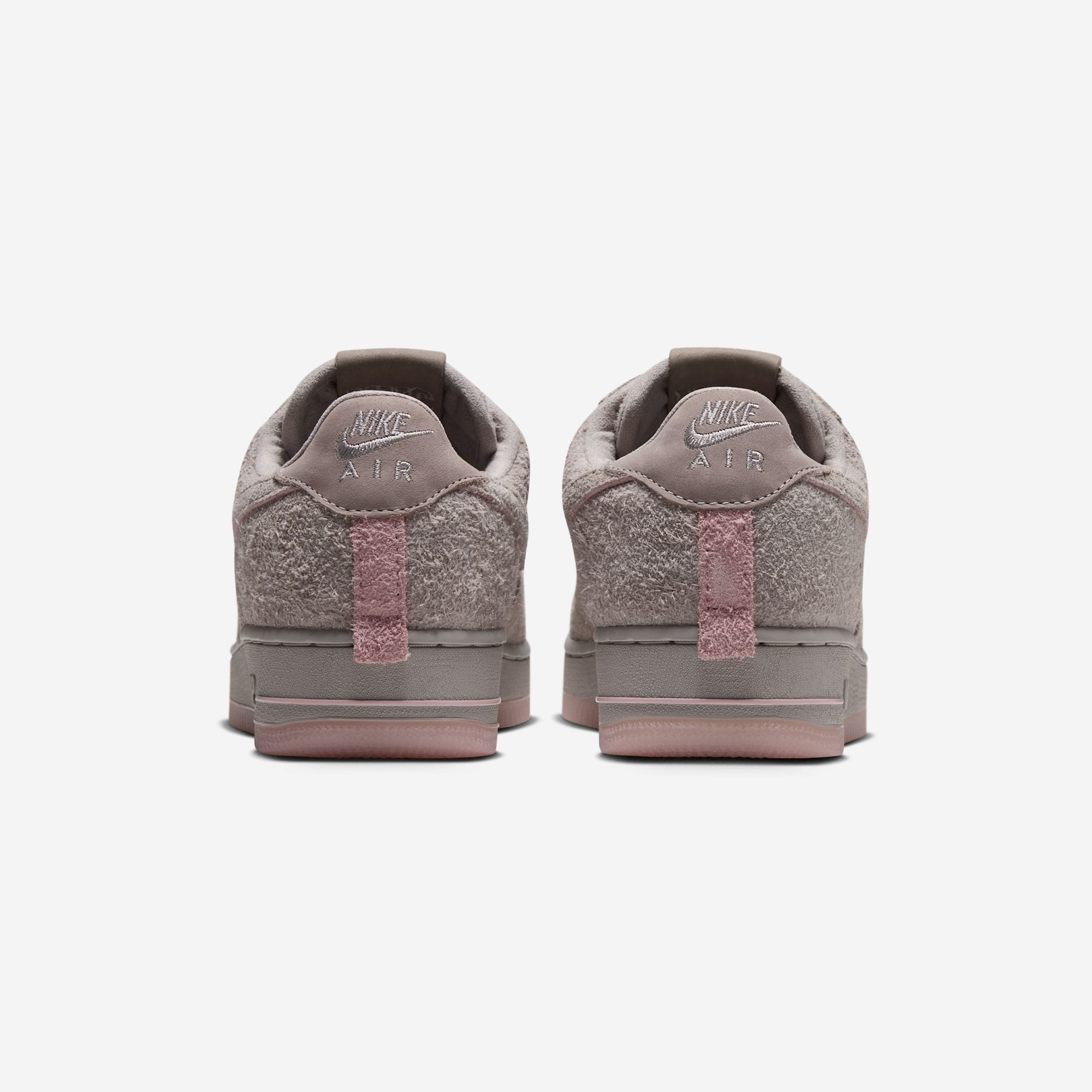 Heel view of the Subway Rat Air Force 1 showing the pink tail-style heel tab