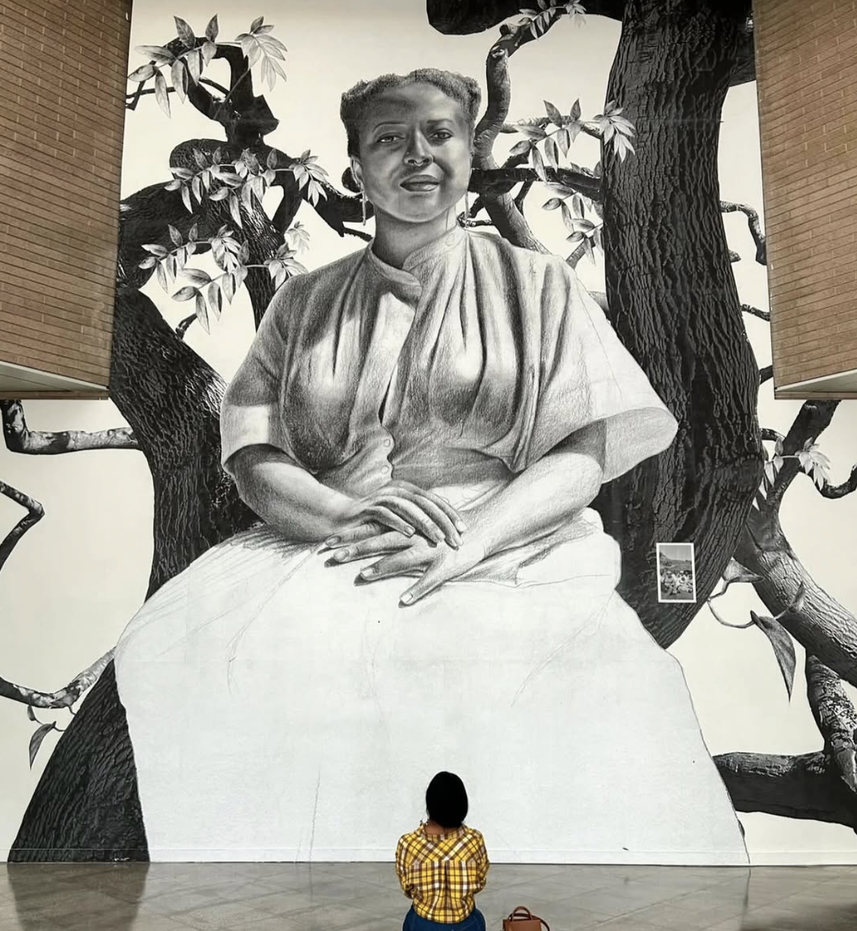 Speaking to Falling Seeds Large Scale Installation by Tatyana Fazlalizadeh