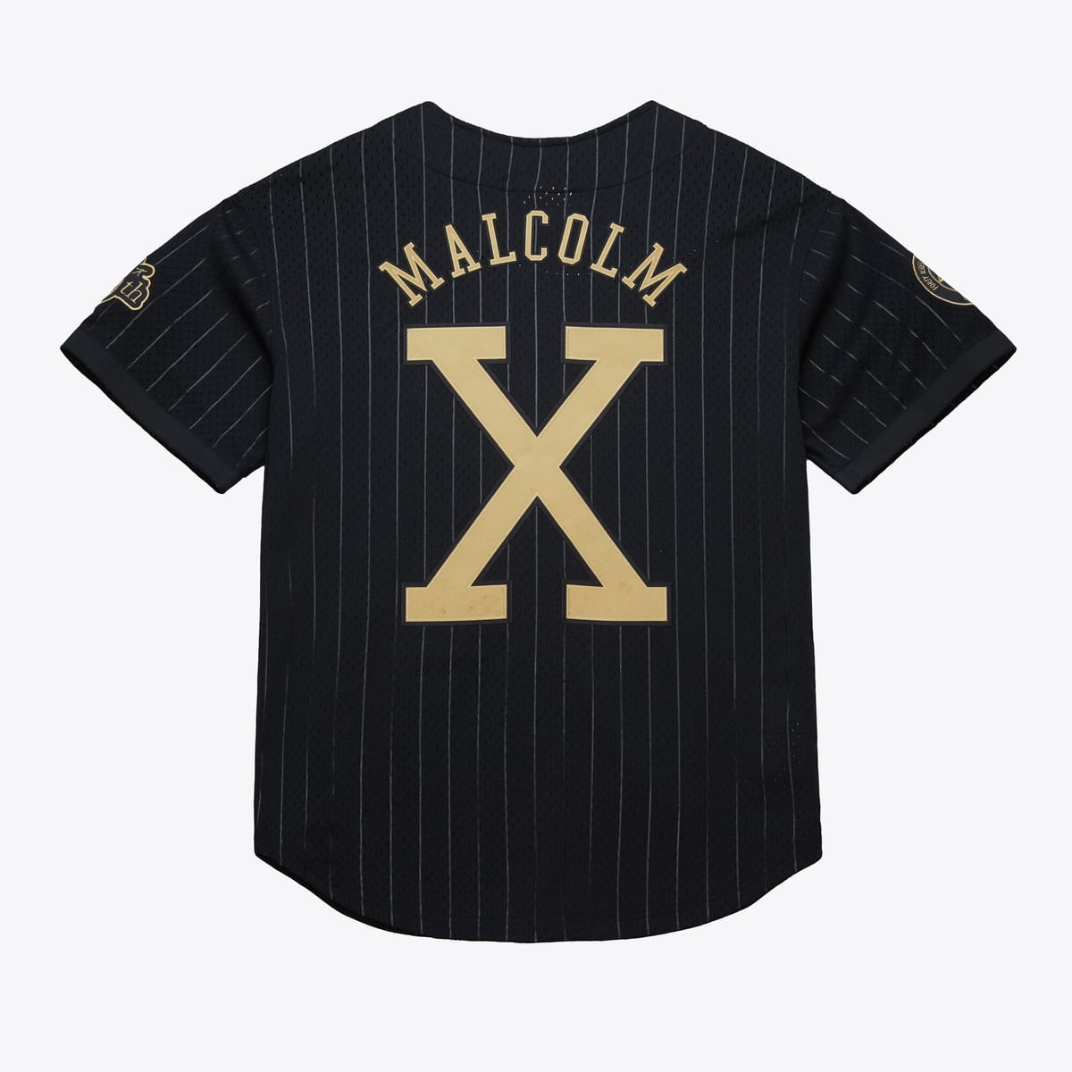 Spike Lee x Mitchell & Ness Honor Malcolm X’s 100th Birthday with Capsule Collection