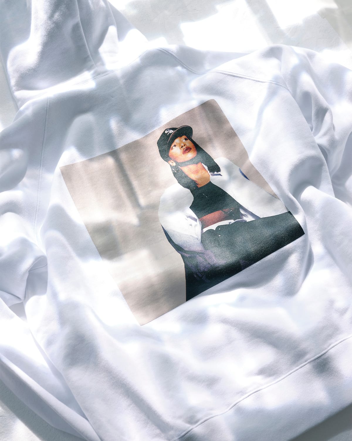 sacai Honors Aaliyah With SS26 Capsule Featuring "At Your Best (You Are Love)" Imagery