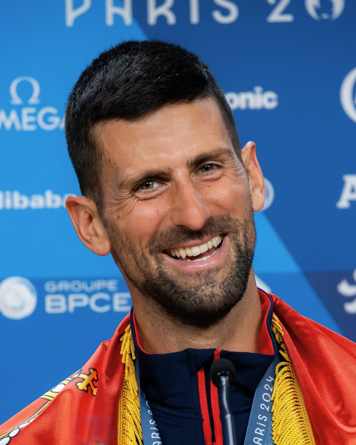 Djokovic Beats Mpetshi Perricard in Four Sets to Open Roland-Garros 2026