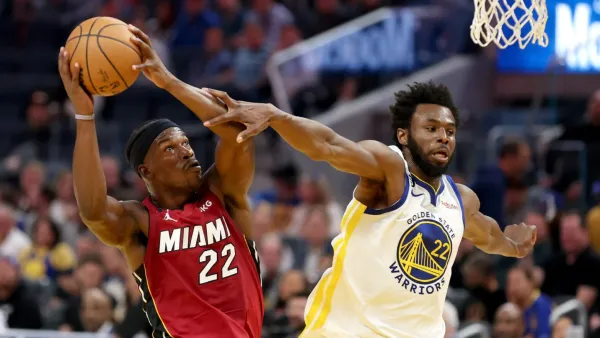 Jimmy Butler heading to Warriors in multi-player deal with Heat