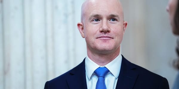 Coinbase Lays Off 14% of Staff and Restructures Around AI 'Player-Coaches'