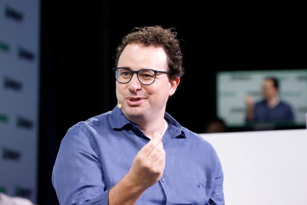 Anthropic CEO Dario Amodei speaking on stage
