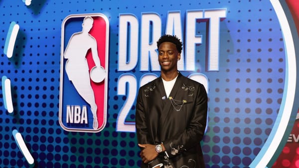 AJ Dybantsa at the 2026 NBA Draft after the Washington Wizards selected him No. 1 overall.