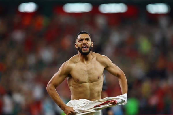Morocco's Ismael Saibari celebrates after scoring the winning penalty against the Netherlands at the 2026 World Cup.