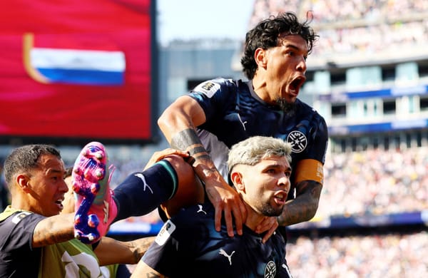 Paraguay players celebrate their penalty shootout win over Germany at the 2026 World Cup.