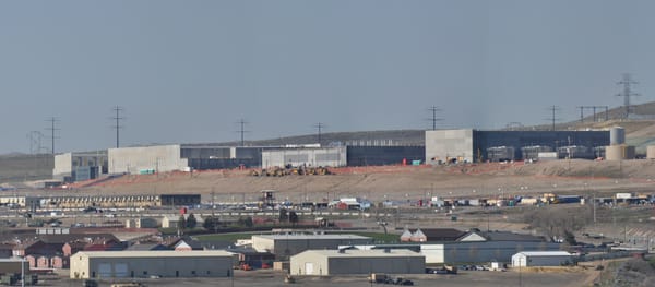 A large-scale data center, representing the compute behind frontier AI labs.