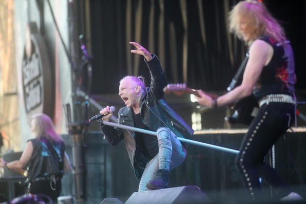Iron Maiden performing live on stage