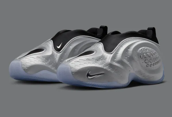 Nike First Sight Shadow Metallic Silver pair, rear three-quarter view showing the molded silver shell and icy outsole