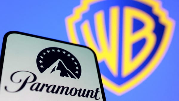 Paramount and Warner Bros. Discovery signage amid the merger antitrust lawsuits.