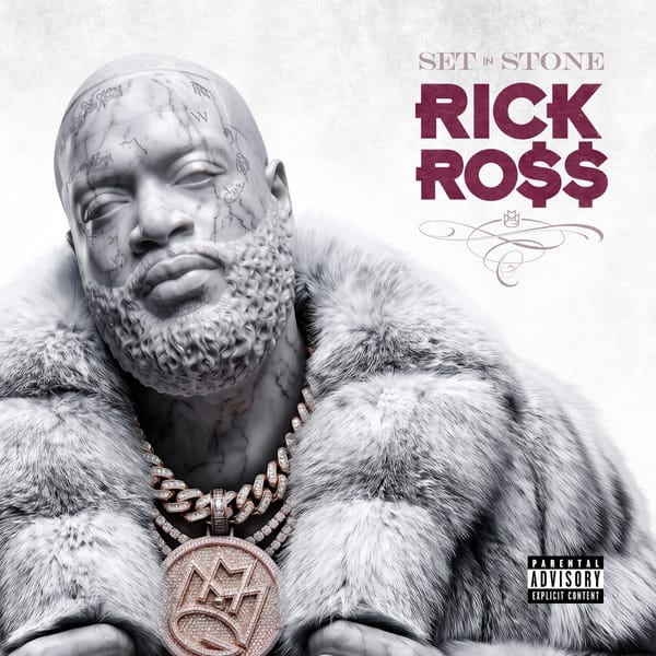Cover art for Rick Ross's album Set In Stone, showing a marble bust of the rapper in a fur coat wearing a Maybach Music chain