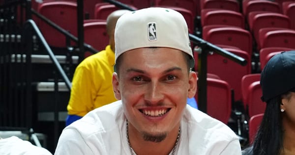 Tyler Herro seated courtside at the Bucks-Heat Summer League game in Las Vegas