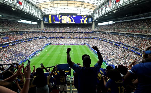 Fans fill a stadium during a 2026 FIFA World Cup group-stage match