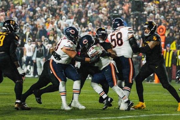 Chicago Bears right tackle Darnell Wright, No. 58, blocking during a game against the Washington Commanders