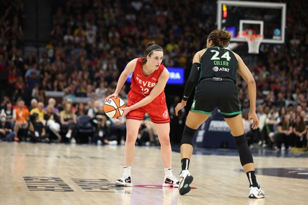 Caitlin Clark of the Indiana Fever and Napheesa Collier of the Minnesota Lynx during a game at Target Center in Minneapolis