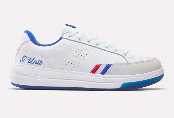 Reebok G-Unit G6 in white leather with a grey suede toe, royal blue G Unit heel script and translucent blue outsole, releasing August 20, 2026