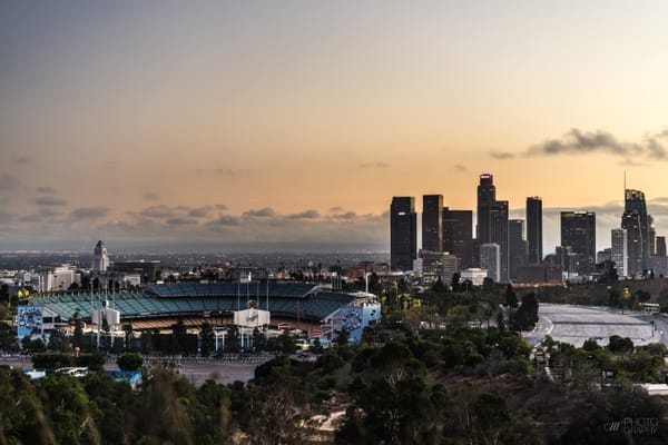 Dodger Stadium with the downtown Los Angeles skyline behind it