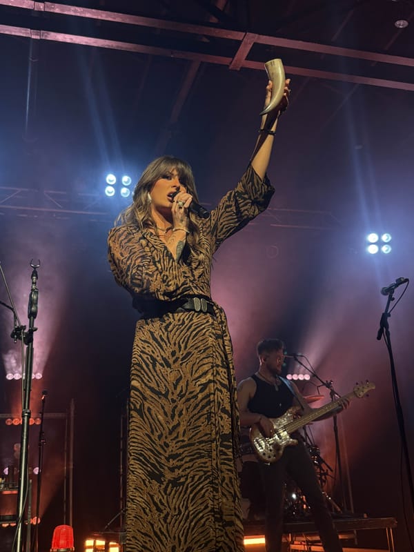 Ella Langley performing on stage in concert