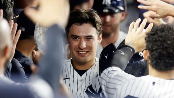 Yankees players celebrate during the Subway Series opener against the Mets at Yankee Stadium