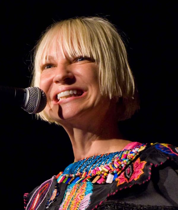 Sia performing live on stage